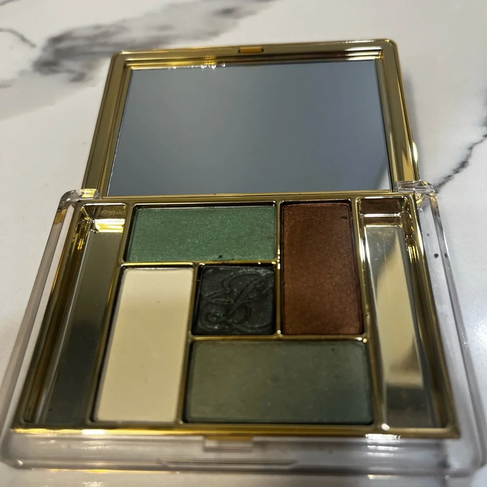 Estēe Lauder Pure Color 09 Esmerald Oasis. Open Box missing the‎ mini brushes